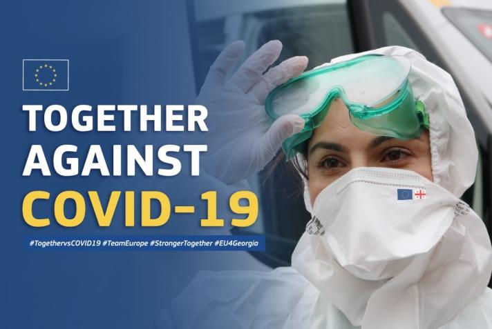 Image of person wearing PPE with text "Together against Covid"