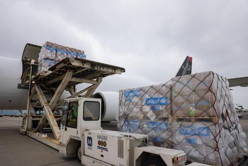 Humanitarian flight to Gaza - plane being loaded with supplies