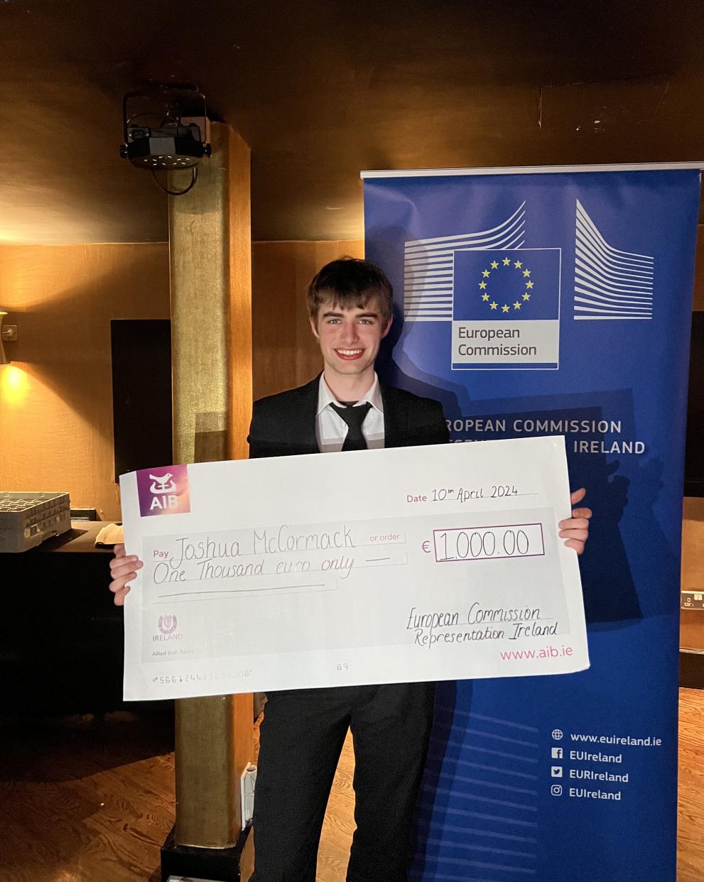Joshua McCormak, winner of the European Commission's Smedia Award 2024 accepting his prize