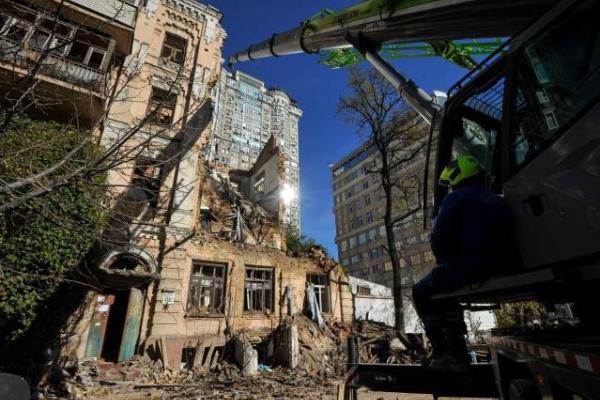 Ukraine: A rescuer clearing rubble from a residential building destroyed by a kamikaze drone attack in downtown Kyiv